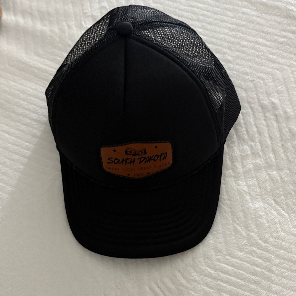 Black Trucker Hat with South Dakota Patch
